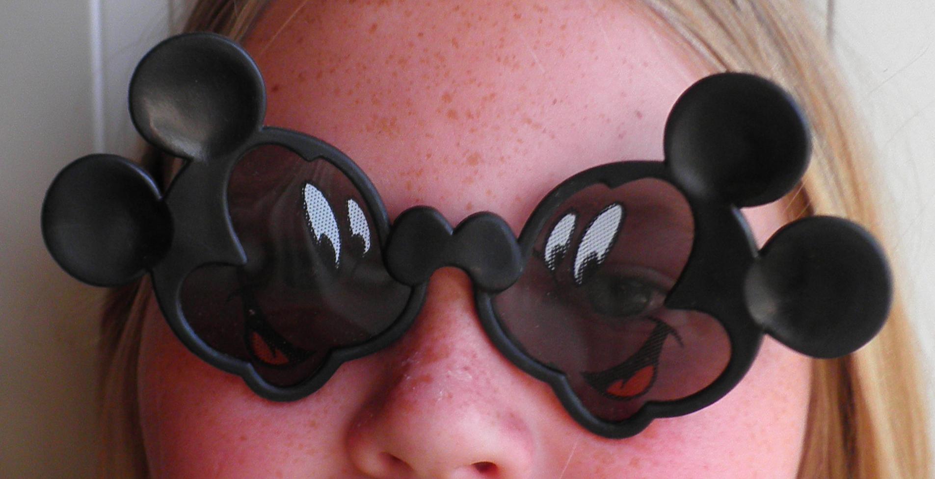 vintage Disney sunglasses and reel to reel cartoon InstAppraisal